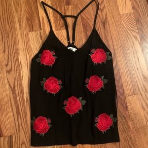 Black tank top with rose patch detailing